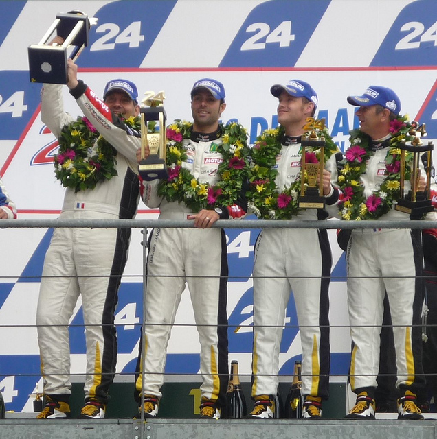 Gabriele on Stage with Trophy and Lonville G24 www.lonville.com www.lonvilleworld.com Gabriel Gardel races with Lonville Lonville Virage G24 at the 2011 Le Mans 2010 and 2011 GT winner Gabriele Gardel of Larbre Competition Corvette Racing